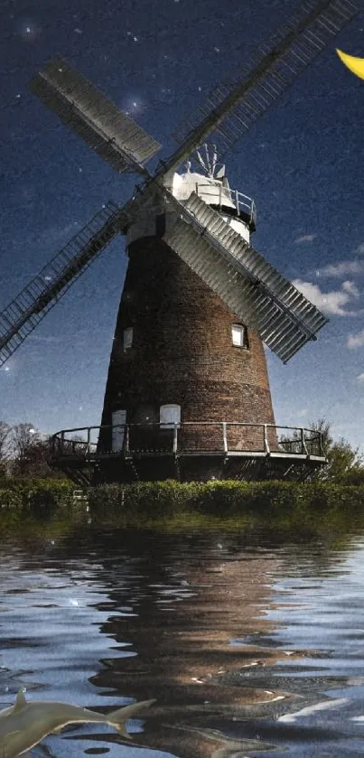 Windmill at night reflected in a moonlit lake with a crescent moon overhead.