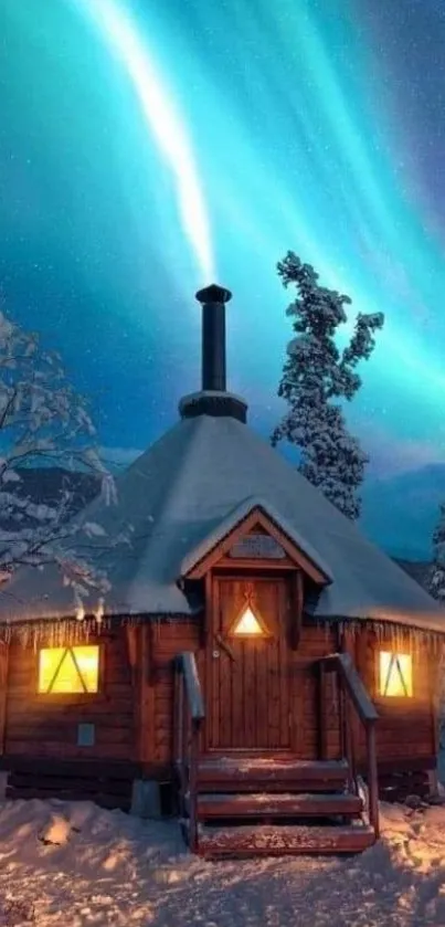 Rustic winter cabin under vibrant Aurora sky.