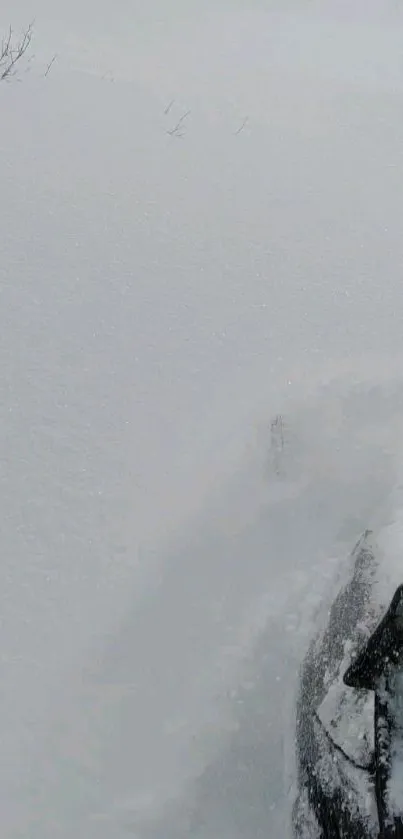 A car driving through deep snow, creating an adventurous winter scene.