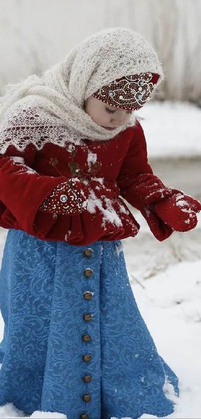 Child in colorful winter attire against snowy backdrop.