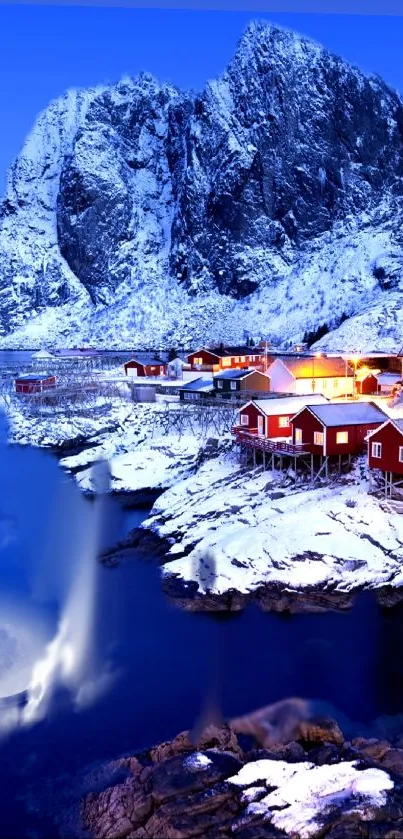 Snowy mountain village under a starry sky at night.