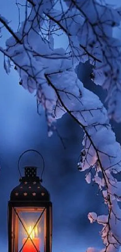 Lantern glowing under snow-laden branches in winter night.