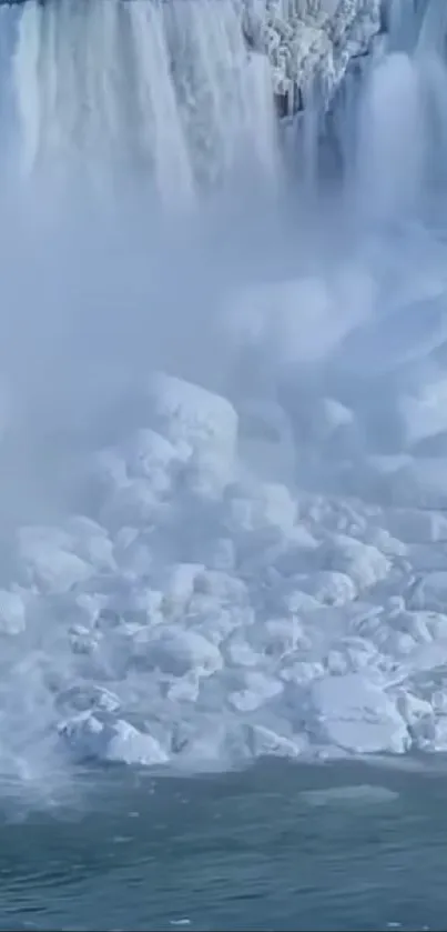 Frozen Niagara Falls in winter with icy blue waterfalls and snow-covered rocks.