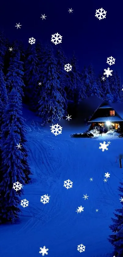 Serene winter night with snowflakes and a cozy cabin.