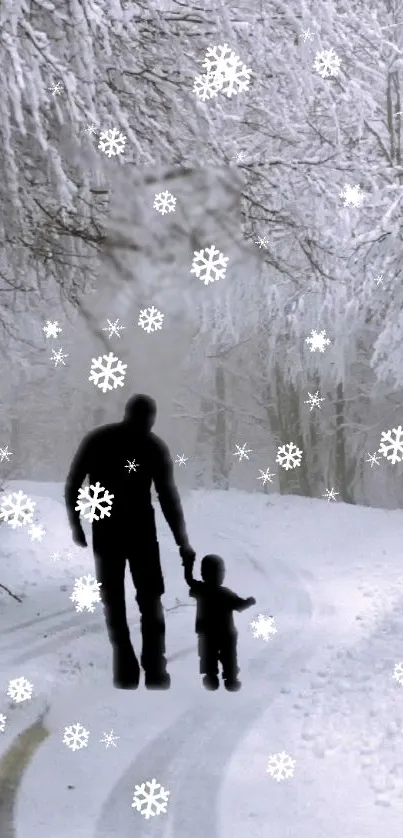 Silhouette of adult and child walking on snowy path with snowflakes.