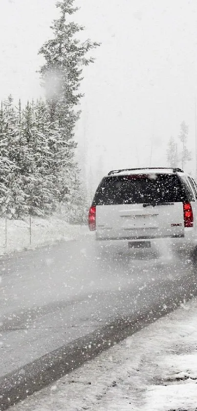 Snow-covered road through a forest in winter.