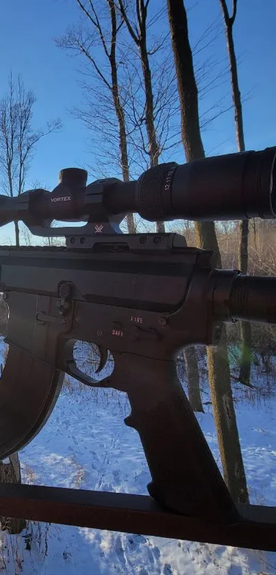 Sniper silhouetted against a winter landscape under a bright blue sky.