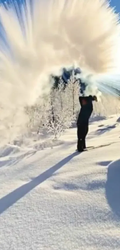 Man creates snow arc in winter landscape under blue sky.