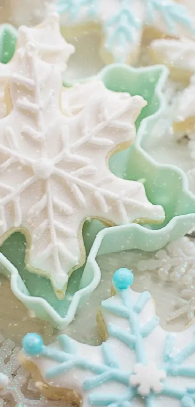 Close-up of decorative snowflake cookies in winter hues.