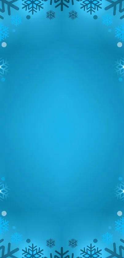 Blue snowflake wallpaper with winter theme.
