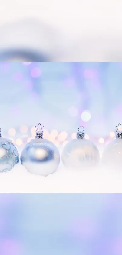 Elegant winter wallpaper with silver ornaments and blurred lights.