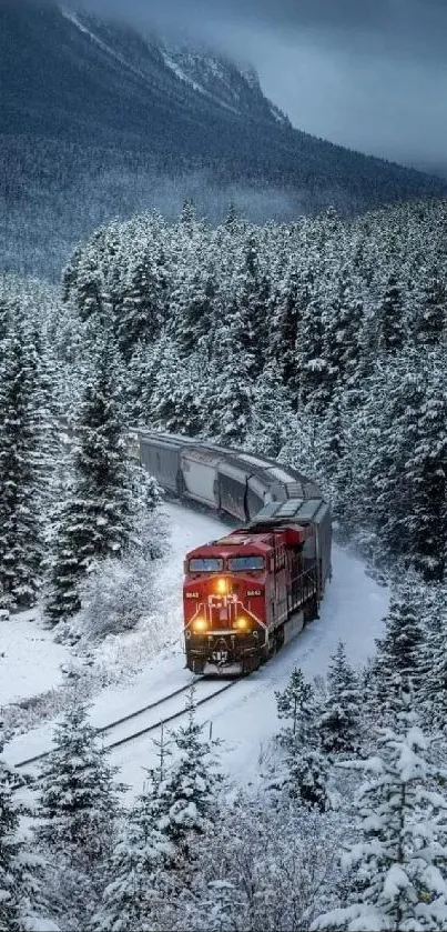 Red train traveling through snowy forest landscape.