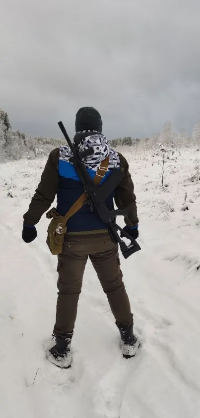 Person in snowy forest with gear, winter scene.