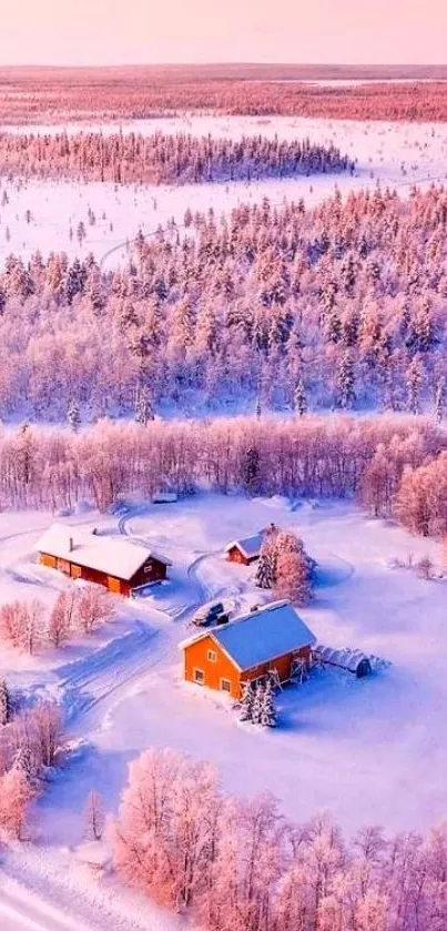 Aerial view of snowy winter forest with pink trees and cozy cabins.