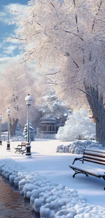 Snowy park with benches and icy river under a bright blue sky.