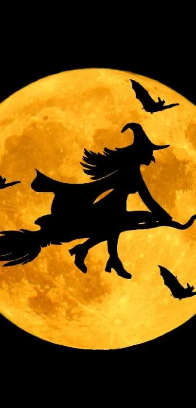 Witch silhouette flying across a golden full moon with bats.