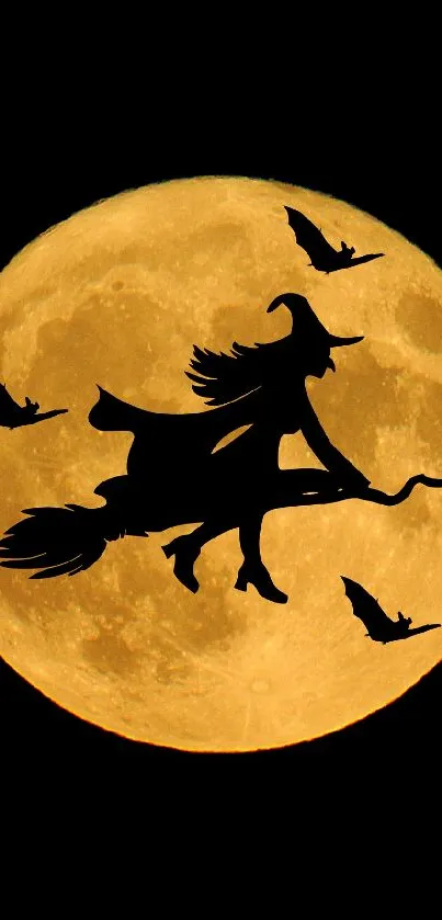 Silhouette of a witch flying past a glowing full moon with bats in the sky.