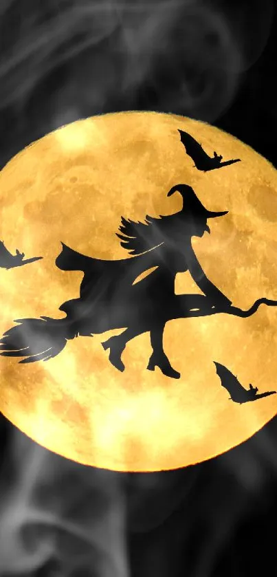 Silhouette of a witch flying across a glowing full moon with bats.