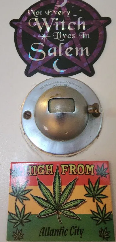 Decorative stickers on a door with witchy theme and cannabis leaf.