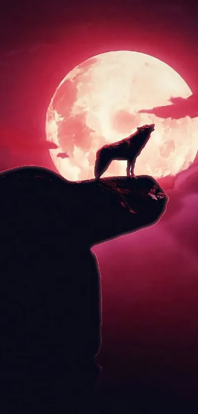 Silhouette of a wolf against a vibrant blood moon.