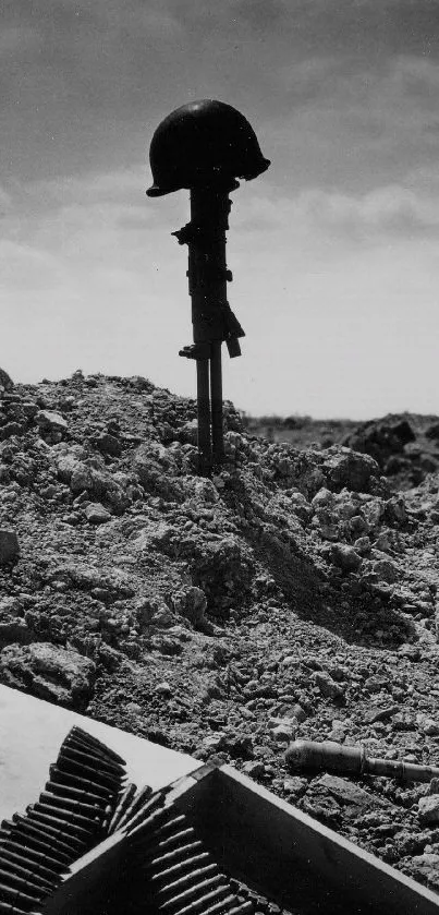 WWII battlefield memorial with helmet silhouette in somber scenery.