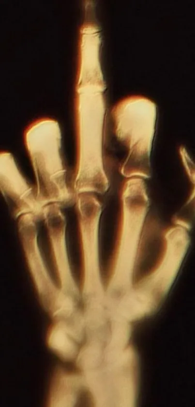 X-ray skeleton hand with glowing bones on a black background.