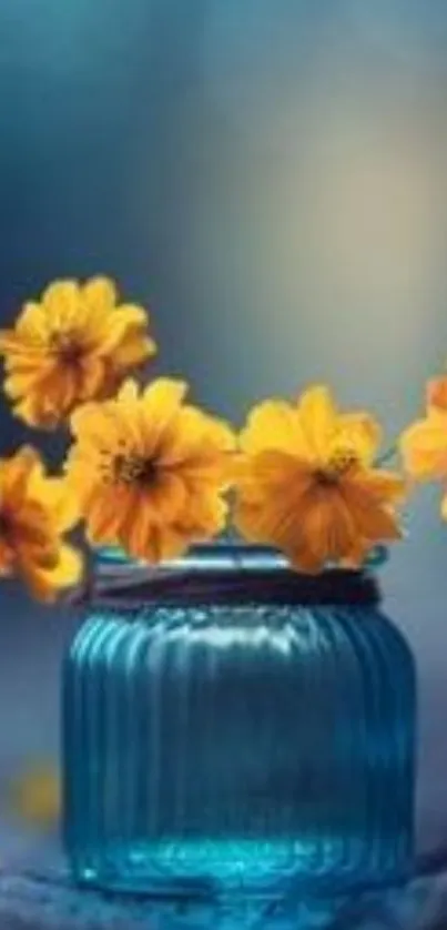 Yellow flowers in blue vase with soft background.