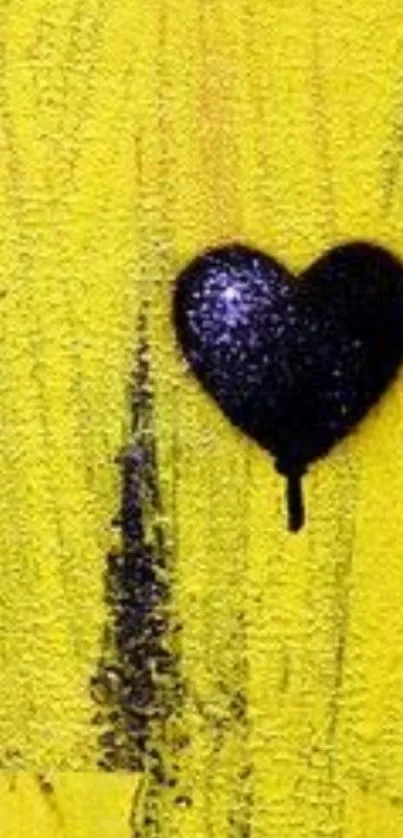 Yellow textured wallpaper with black heart graffiti.