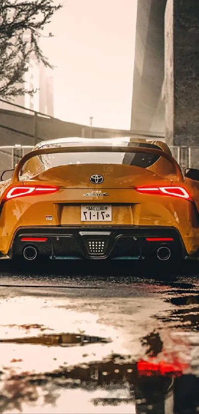 Yellow sports car on wet urban street with vivid rear lights.