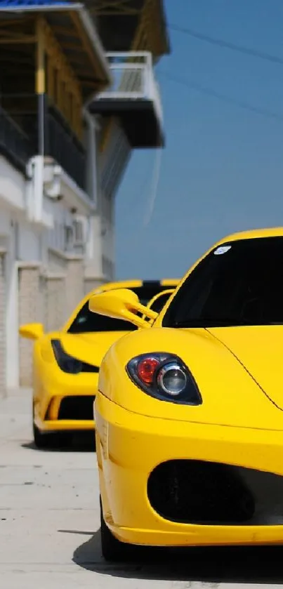 Yellow sports car parked on a race track.