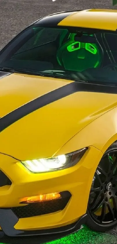 Yellow sports car with green accents on gray road.