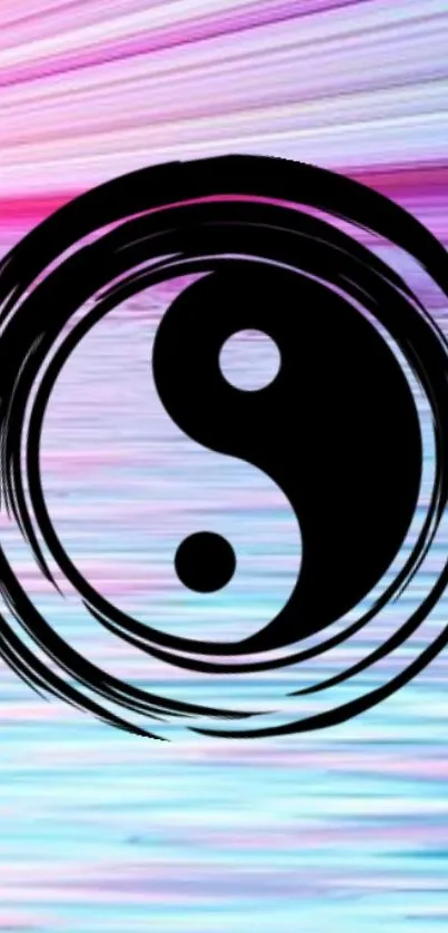 Yin Yang symbol over pink and blue abstract background.