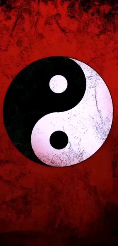 Yin yang symbol on a red textured background.