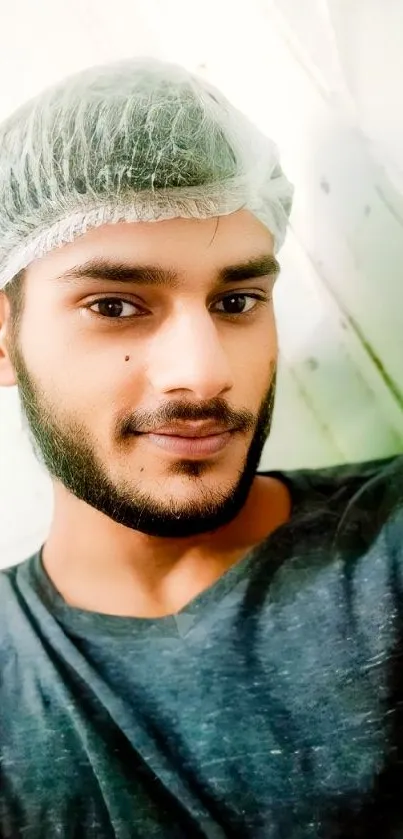 Young man in casual wear with hair net.