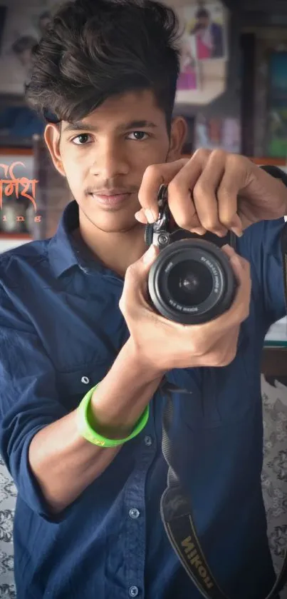 Young photographer with camera in a creative portrait.