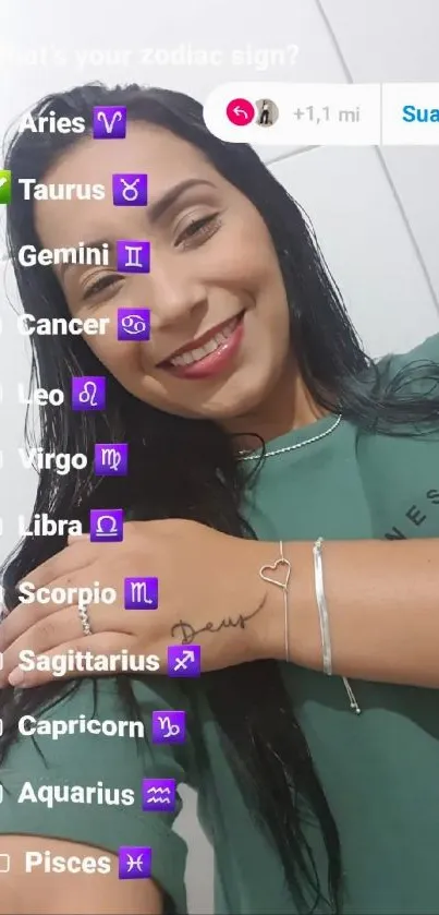 Woman posing with zodiac sign list and bracelet.