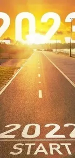 Sunrise road with '2023' over horizon