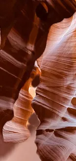 Intricate rock formations at Antelope Canyon, showcasing earthy tones and textures.