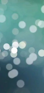 Abstract teal bokeh mobile wallpaper with soft light circles.