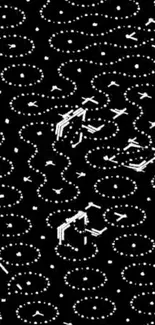 Intricate black and white dotted wallpaper design.