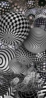 Abstract black and white spheres with intricate patterns creating depth.