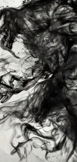 Abstract black smoke art with swirling patterns.