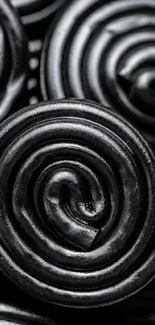 Abstract black swirl design with elegant curves.