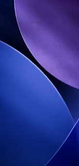 Abstract wallpaper with blue and purple circles.
