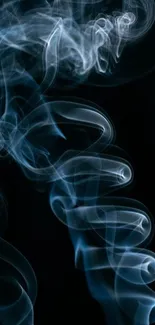 Abstract blue smoke swirls on dark background wallpaper.