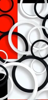 Abstract wallpaper with black, white, and red circles.