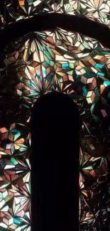 Colorful abstract stained glass design with geometric patterns.