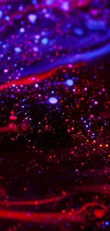 Abstract cosmic nebula wallpaper with purple and red hues.