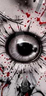 Abstract eye art with black and red splashes on white background.