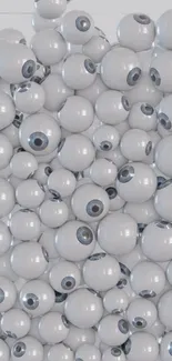 Mobile wallpaper with a surreal collection of eyeballs.